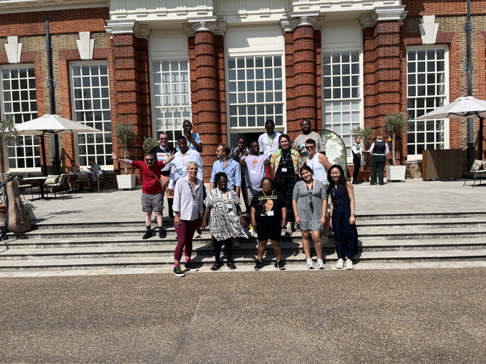 A group of Share students, staff and volunteers outside the orangery at Kensington Palace