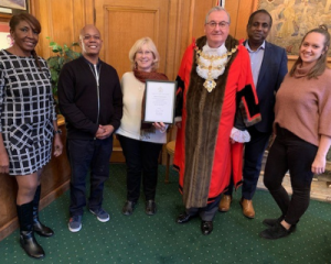 Receiving an award from the Mayor of Wandsworth for services during the pandemic