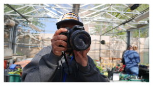Close up of a man taking a photo