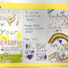 Colourful postcards and messages including "To all the students at Share, happy World Mental Health Week" from pupils at Eaton House the Manor Girls' school