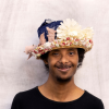 Karim modelling a hat design. Photo credit: Michele Panzeri