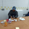 Independent living skills student learning cooking skills