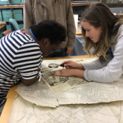Students looking at historical documents